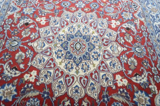 Central medallion detail of 2000s Nain rug from Iran / Persia