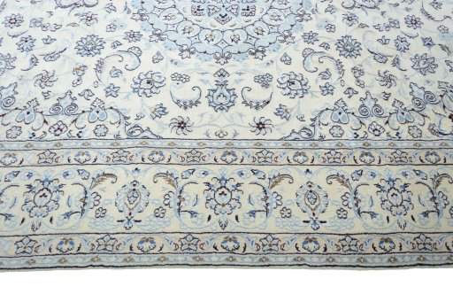 Corner detail of New Nain rug showing border pattern and Wool pile