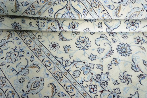Close-up detail of New Nain rug from Iran / Persia showing Wool weave