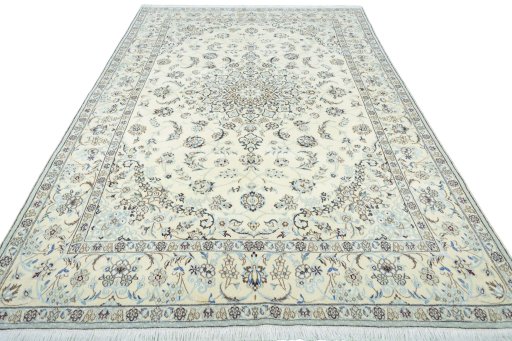 Surface texture of 2000s Nain rug with natural Wool and intricate pattern