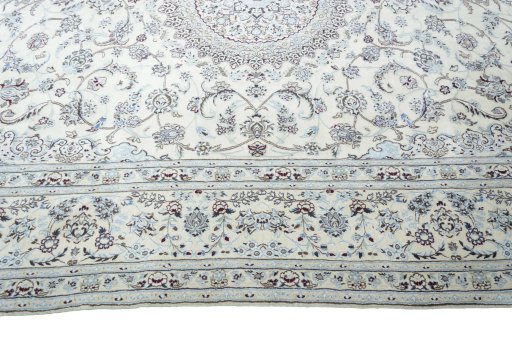 Corner detail of New Nain rug showing border pattern and Wool pile