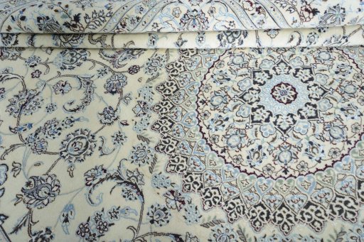 Surface texture of New Nain rug with natural Wool and intricate pattern