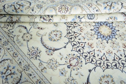 Close-up detail of 2000s Nain rug from Iran / Persia showing Wool weave