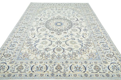 Surface texture of 2000s Nain rug with natural Wool and intricate pattern