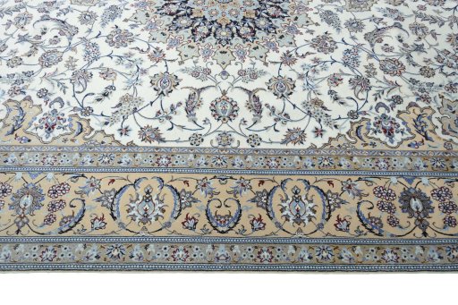 Corner detail of New Nain rug showing border pattern and Cork pile