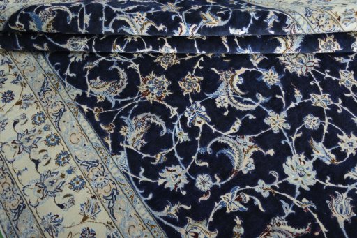 Close-up detail of 2000s Nain rug from Iran / Persia showing Wool weave