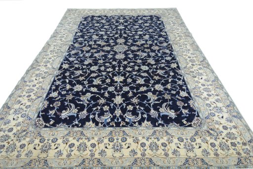 Surface texture of 2000s Nain rug with natural Wool and intricate pattern