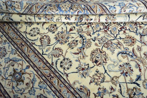 Close-up detail of 2000s Nain rug from Iran / Persia showing Wool weave