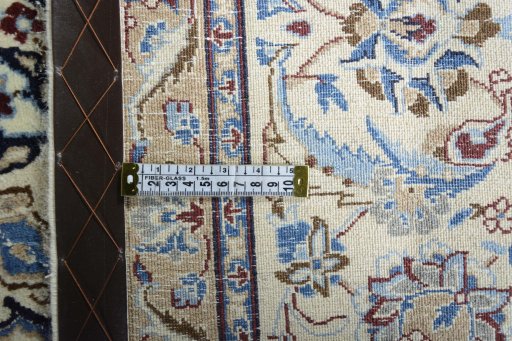 Backside of handmade 2000s Nain rug showing knot structure and weave density