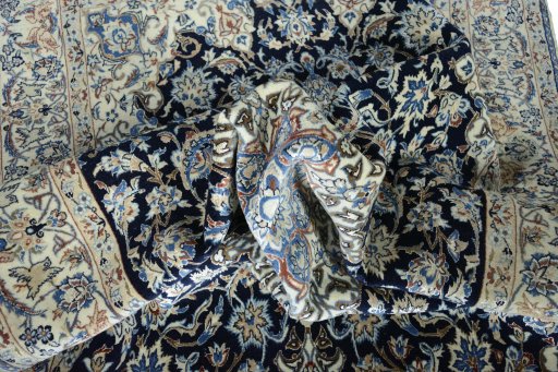 Surface texture of 1970s Nain rug with natural Cork and intricate pattern