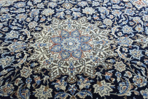 Central medallion detail of 1970s Nain rug from Iran / Persia