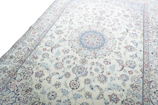 Backside of handmade 2000s Nain rug showing knot structure and weave density