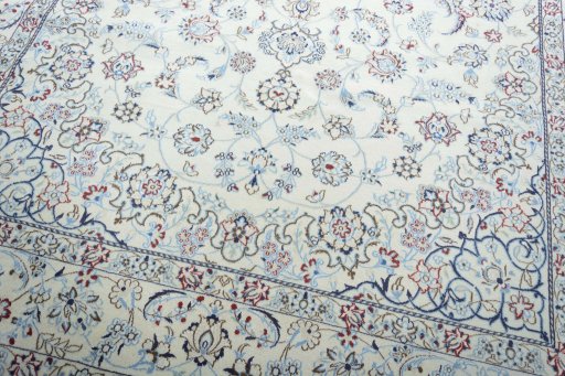 Close-up detail of 2000s Nain rug from Iran / Persia showing Wool weave
