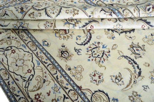 Close-up detail of 2000s Nain rug from Iran / Persia showing Wool weave