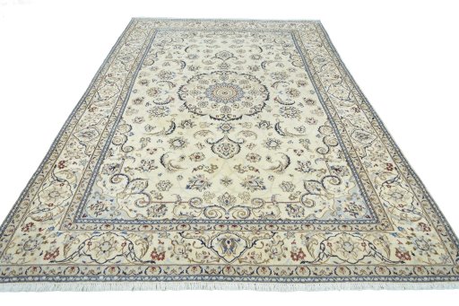 Surface texture of 2000s Nain rug with natural Wool and intricate pattern