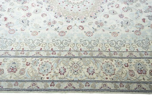 Corner detail of New Nain rug showing border pattern and Wool pile