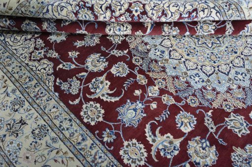 Close-up detail of 2000s Nain rug from Iran / Persia showing Wool weave