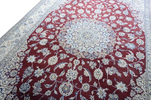 Backside of handmade 2000s Nain rug showing knot structure and weave density