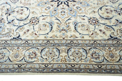 Corner detail of New Nain rug showing border pattern and Wool pile