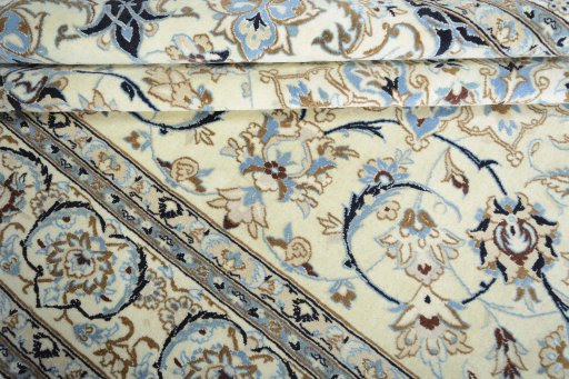 Close-up detail of New Nain rug from Iran / Persia showing Wool weave