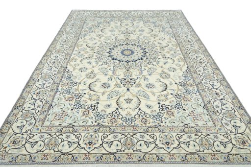 Surface texture of 2000s Nain rug with natural Wool and intricate pattern