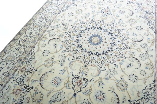 Backside of handmade 2000s Nain rug showing knot structure and weave density