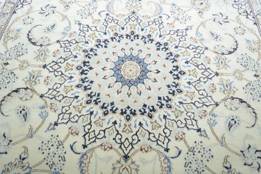 Central medallion detail of 2000s Nain rug from Iran / Persia