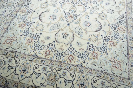 Close-up detail of 2000s Nain rug from Iran / Persia showing Wool weave