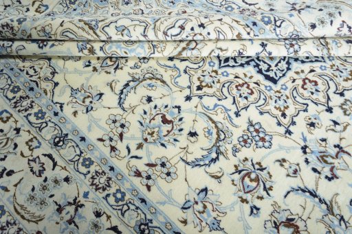 Close-up detail of 2000s Nain rug from Iran / Persia showing Wool weave