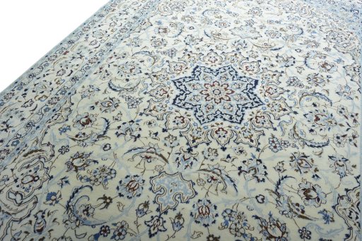 Backside of handmade 2000s Nain rug showing knot structure and weave density