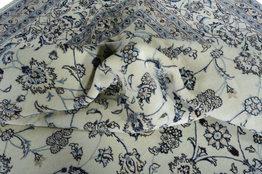 Surface texture of New Nain rug with natural Wool and intricate pattern
