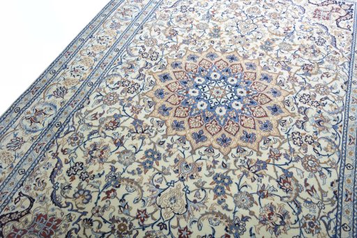 Backside of handmade 2000s Nain rug showing knot structure and weave density