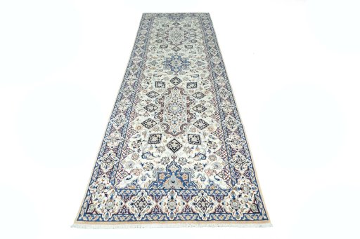 Surface texture of 2000s Nain rug with natural Wool and intricate pattern