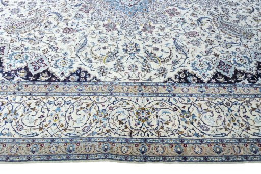 Corner detail of 2000s Nain rug showing border pattern and Cork pile