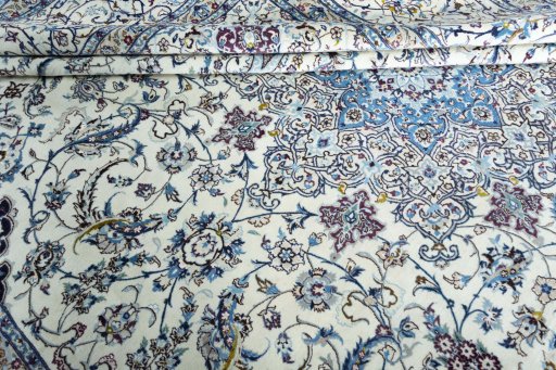 Close-up detail of 2000s Nain rug from Iran / Persia showing Cork weave