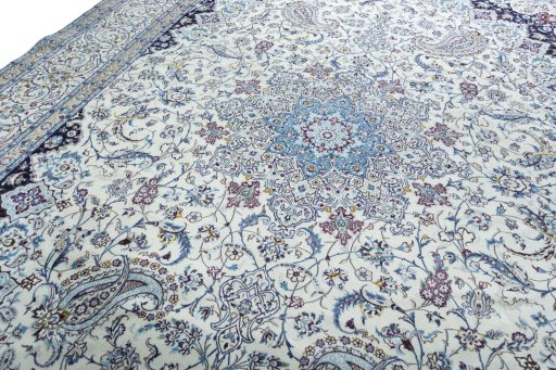 Backside of handmade 2000s Nain rug showing knot structure and weave density