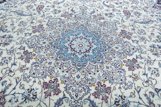 Central medallion detail of 2000s Nain rug from Iran / Persia