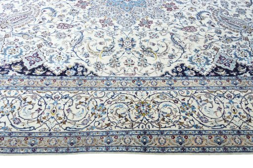 Corner detail of 2000s Nain rug showing border pattern and Cork pile