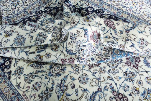 Surface texture of 2000s Nain rug with natural Cork and intricate pattern