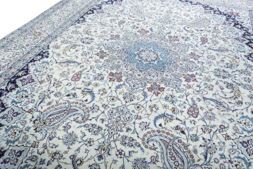 Backside of handmade 2000s Nain rug showing knot structure and weave density