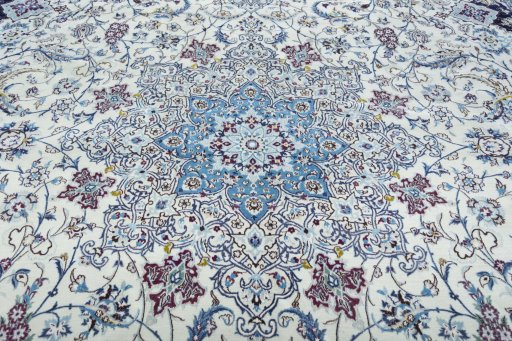 Central medallion detail of 2000s Nain rug from Iran / Persia