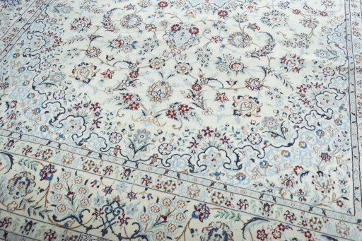 Close-up detail of 2000s Nain rug from Iran / Persia showing Wool weave