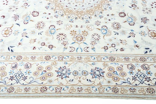 Corner detail of New Nain rug showing border pattern and Wool pile