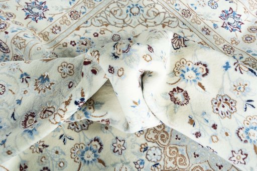 Surface texture of New Nain rug with natural Wool and intricate pattern