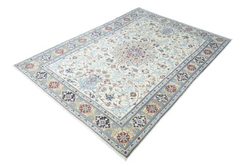 Corner detail of 2000s Nain rug showing border pattern and Wool pile