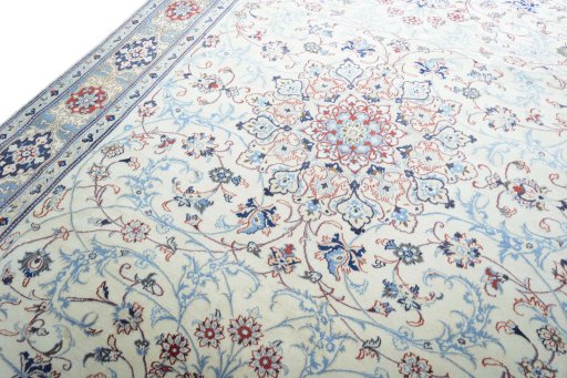 Backside of handmade 2000s Nain rug showing knot structure and weave density