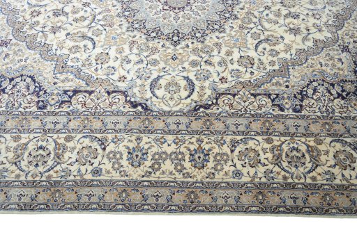 Corner detail of 2000s Nain rug showing border pattern and Cork pile