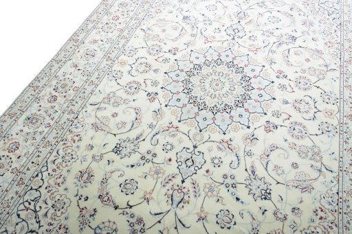 Backside of handmade New Nain rug showing knot structure and weave density