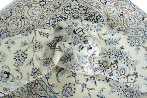 Surface texture of New Nain rug with natural Wool and intricate pattern