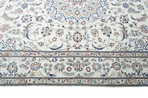 Corner detail of New Nain rug showing border pattern and Wool pile
